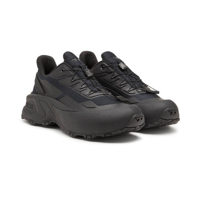 A black Diesel D-Cage Runner Trainer